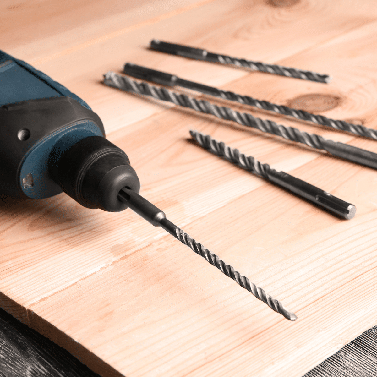 close up of drill log Screws on a wooden plank