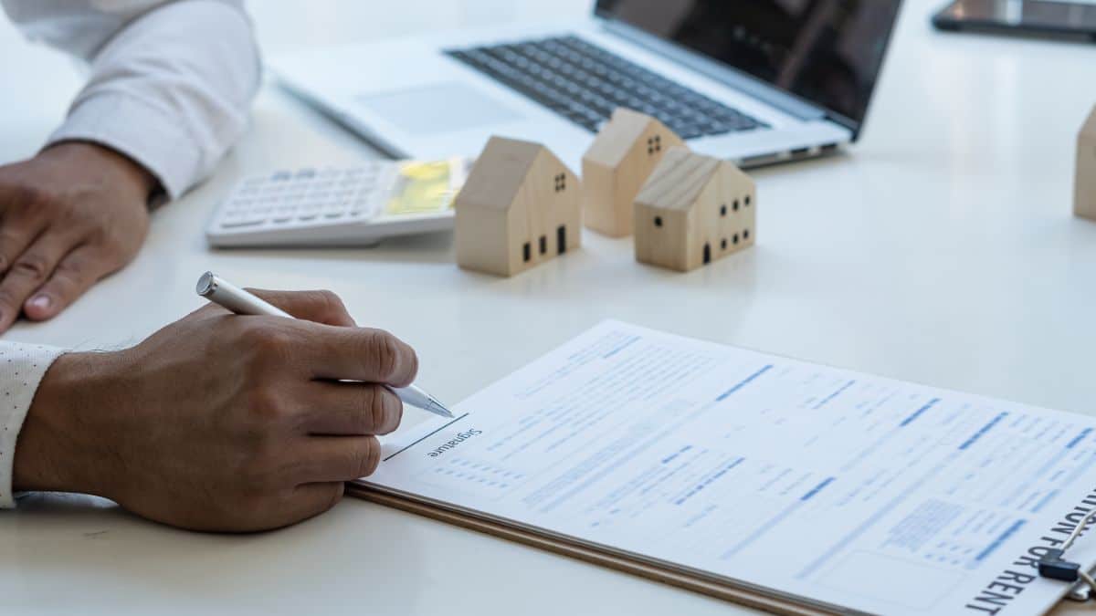 hand signing a sample contract