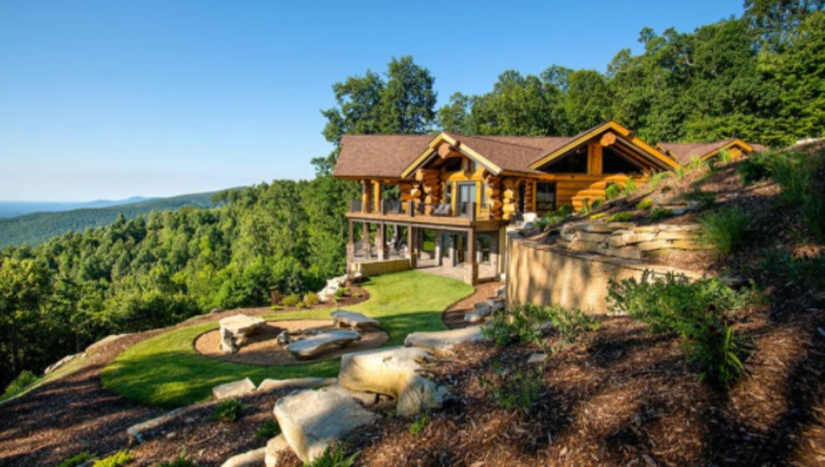 giant log home on a slope