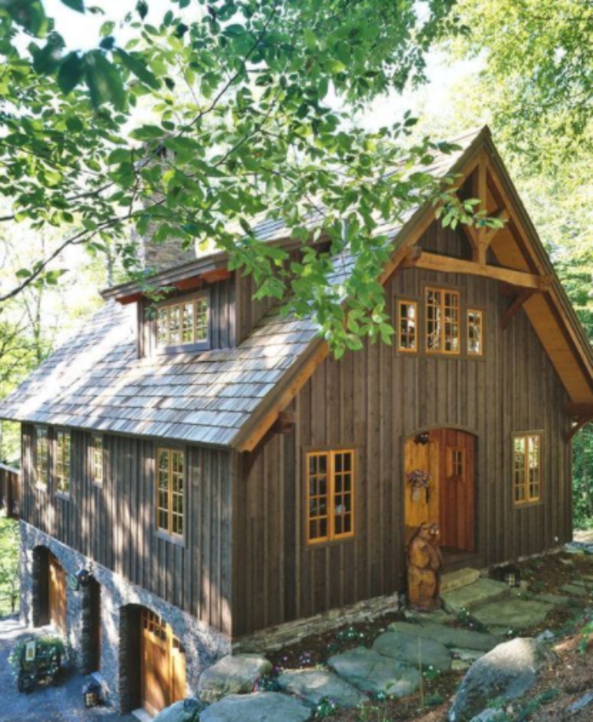 large log cabin with a garage