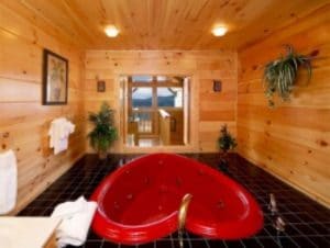 Log cabin with heart shape bath tub