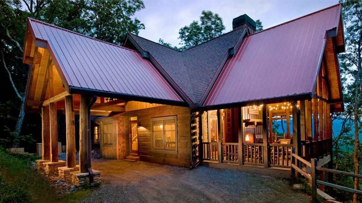 Log cottage at night