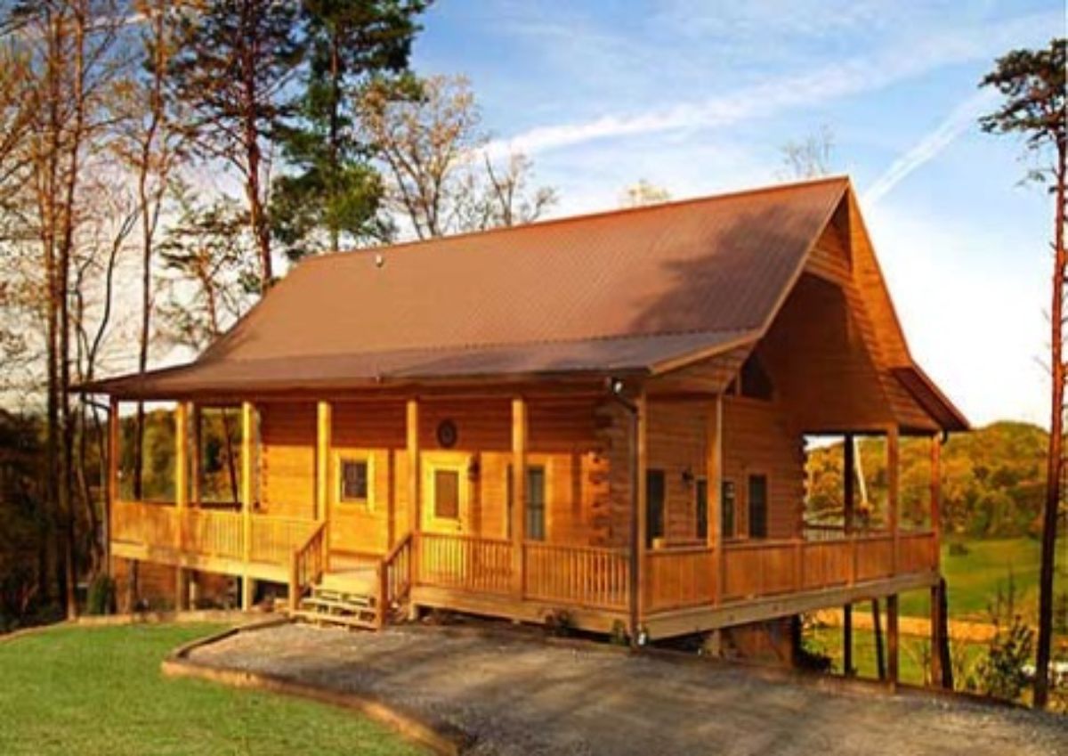 small log home in the sunlight