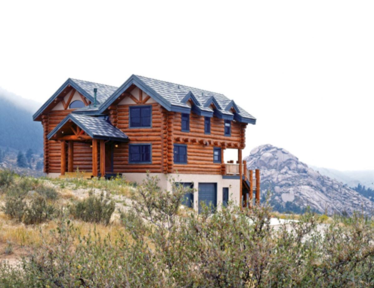 giant log home on a slope