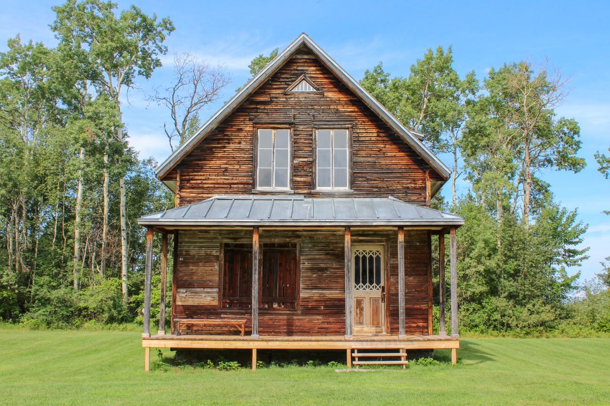 Log home with greenery