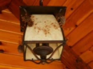 outdoor light installed in a log home