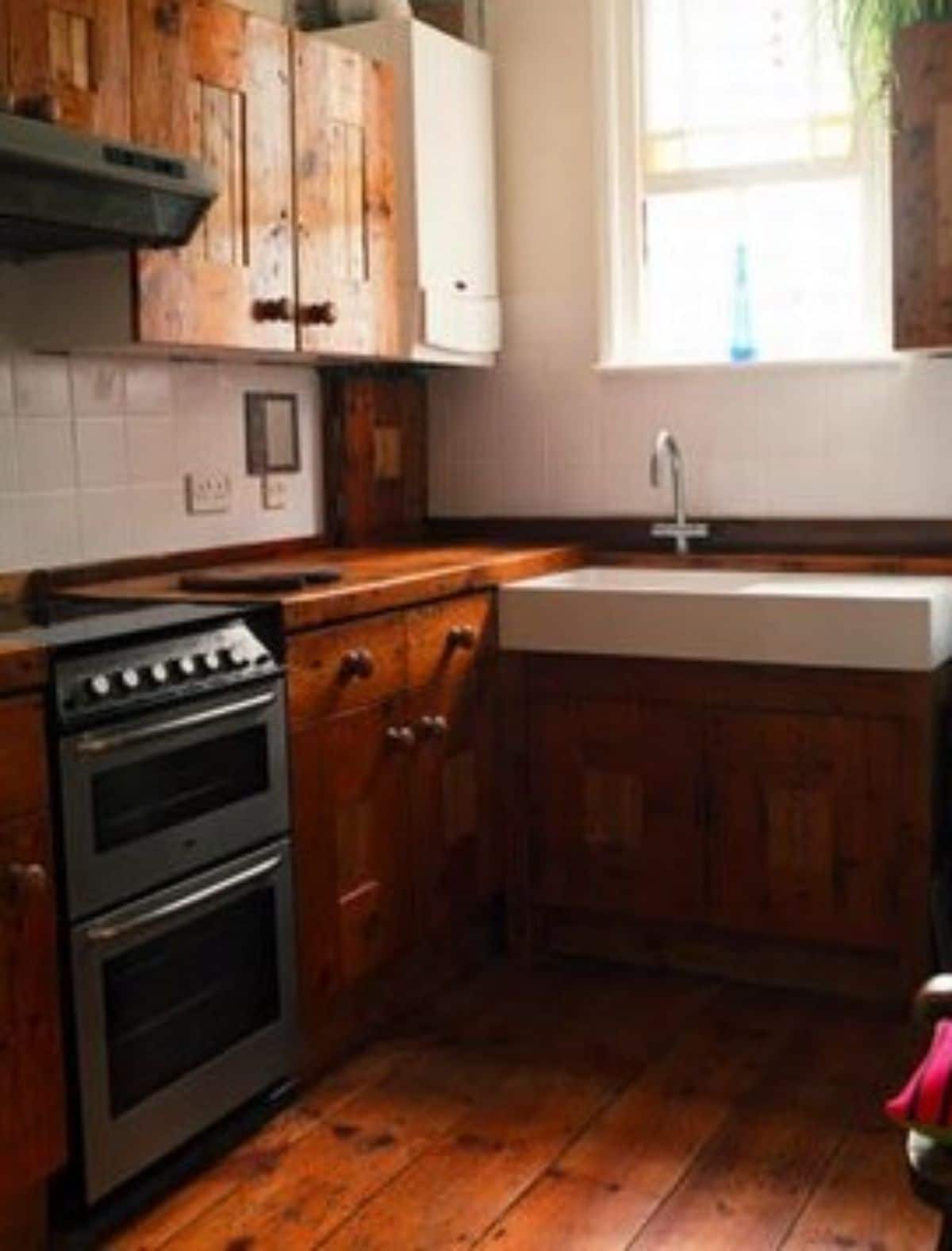 kitchen cabinets made with reclaimed wood