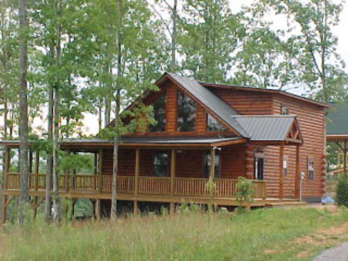 Log cabin in grass