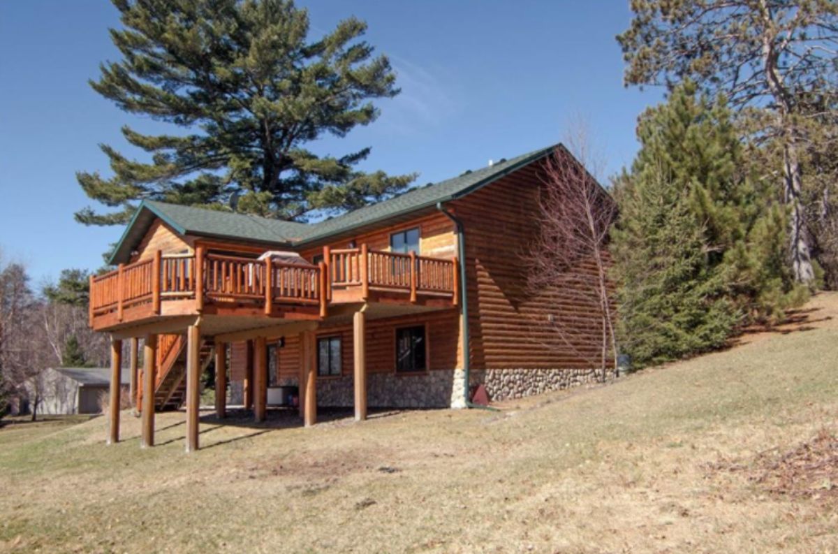 Log basement home on slope