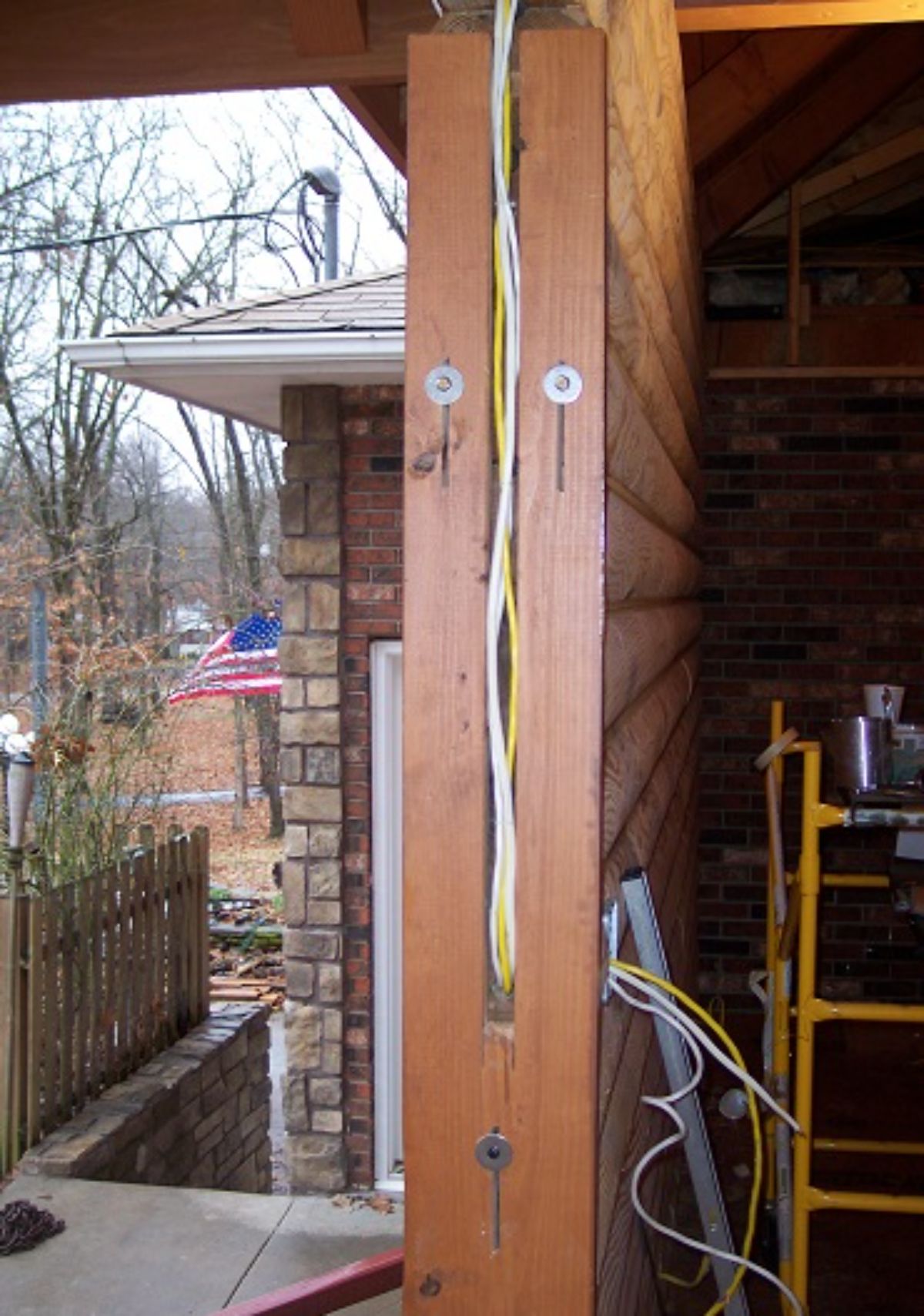 wiring inside a log cabin entrance