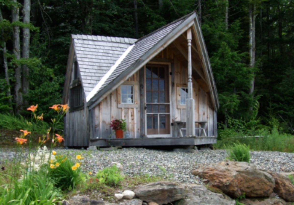 Small log cabin in woods