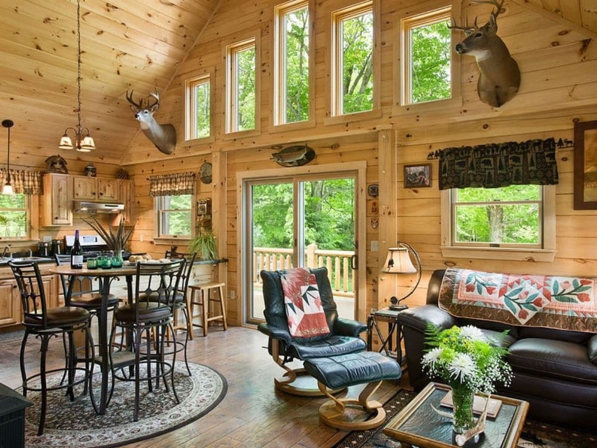 large open windows on side of log cabin