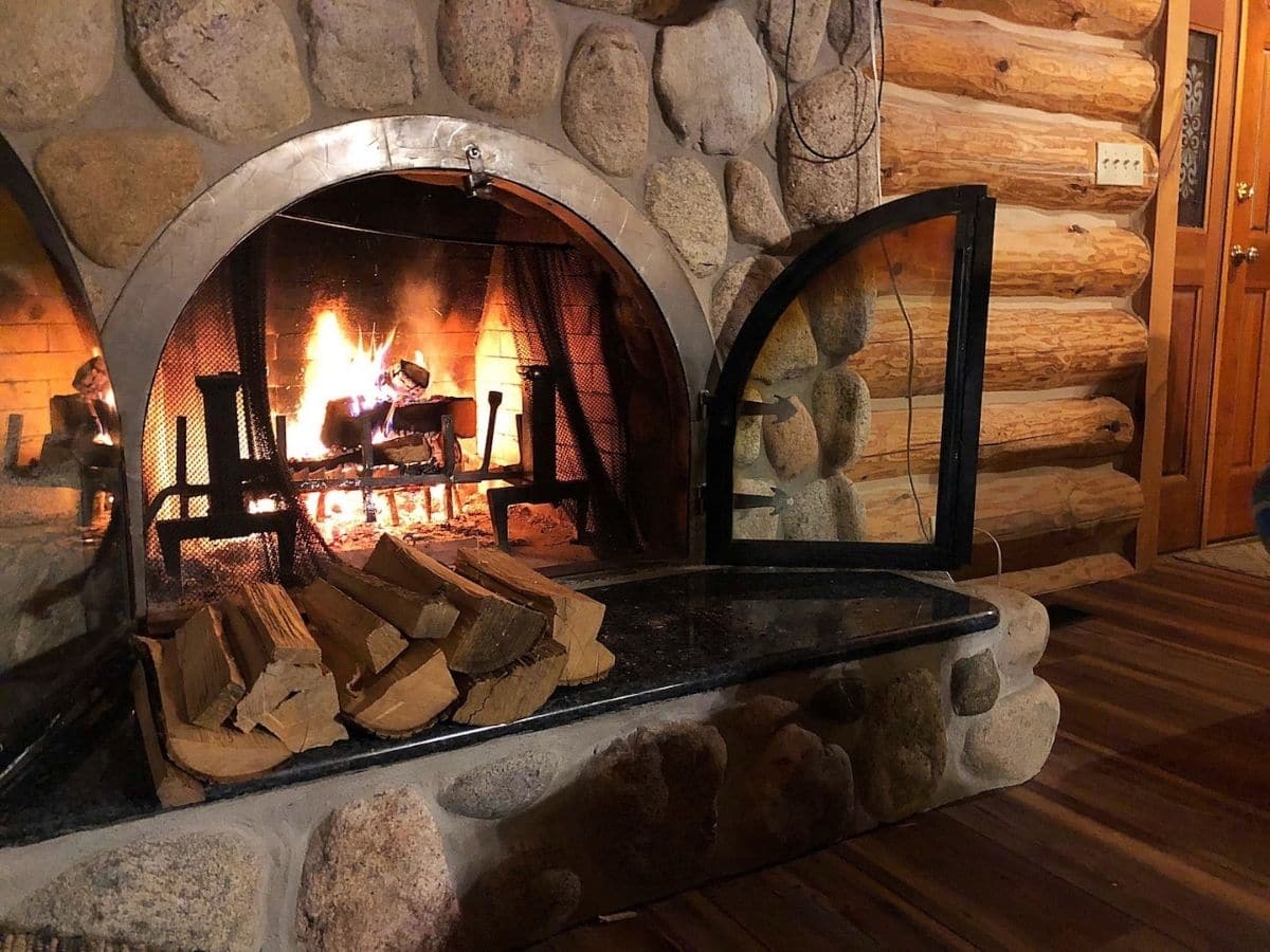 fireplace with logs burning