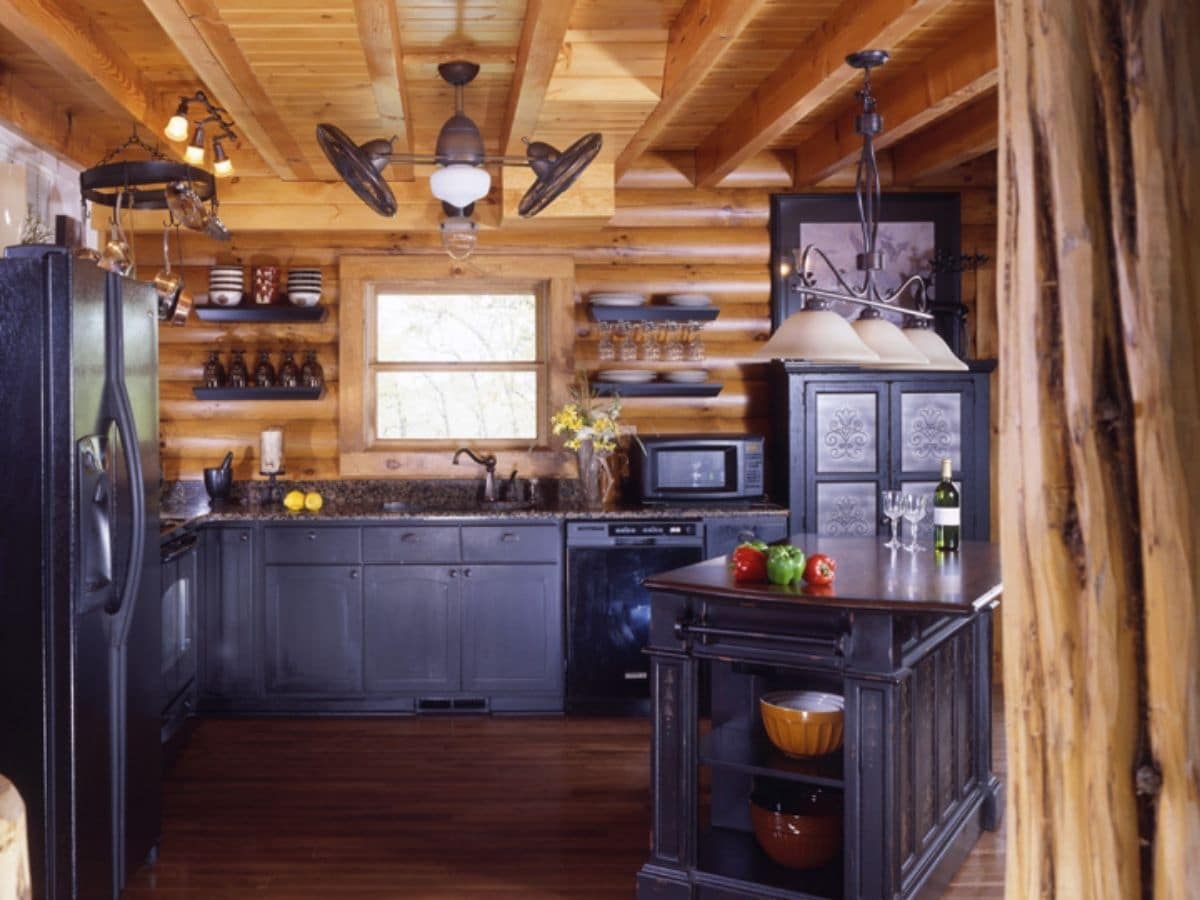 kitchen with dark wood cabinets and island on right side