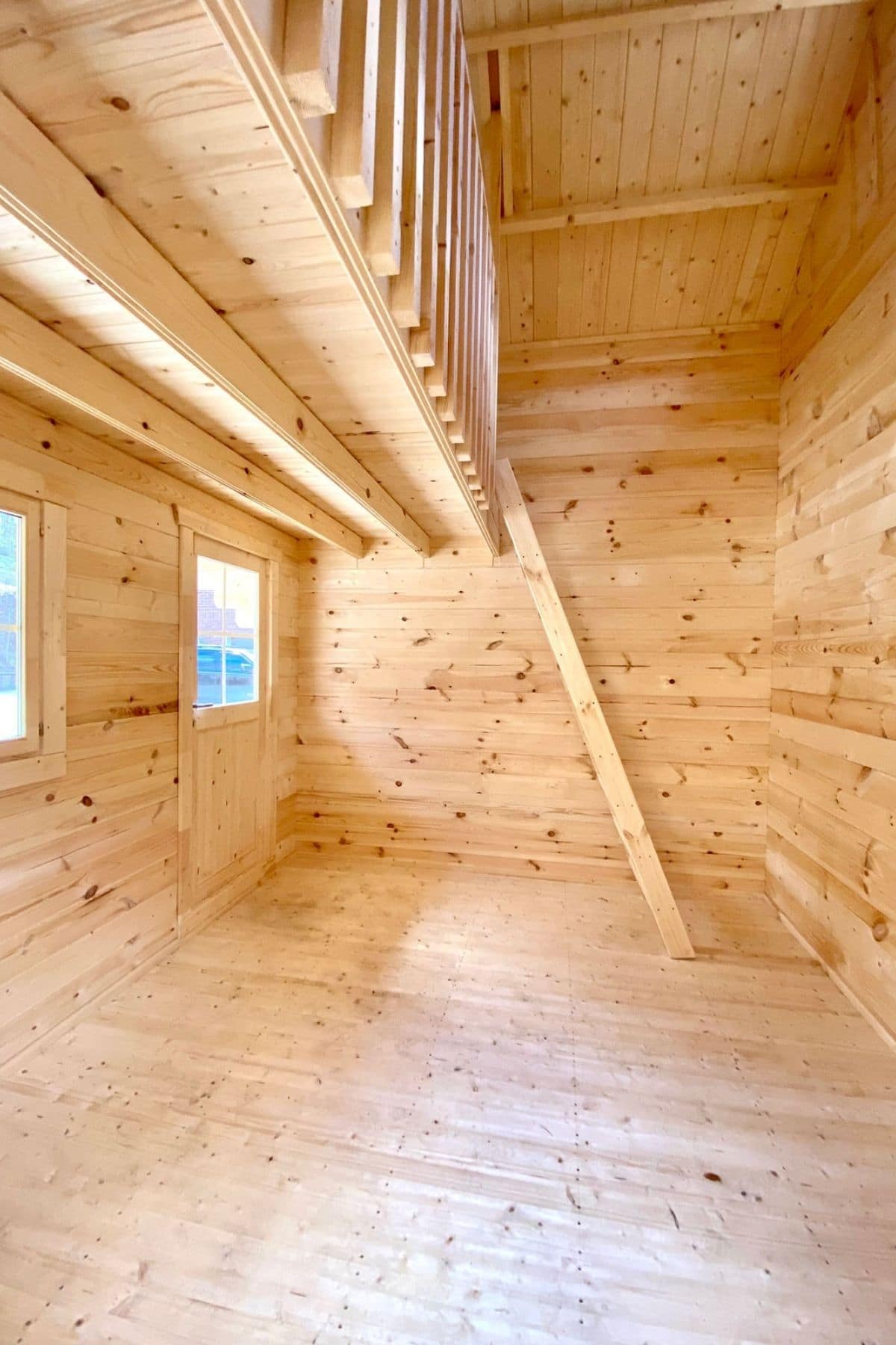 pine wood walls and floors inside hillgrand tiny cabin