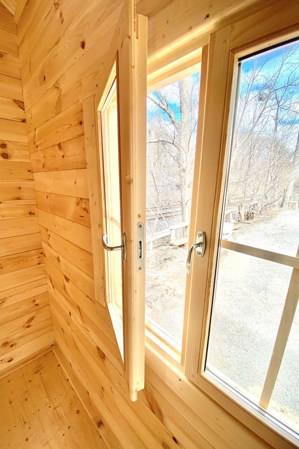 open window of log hut