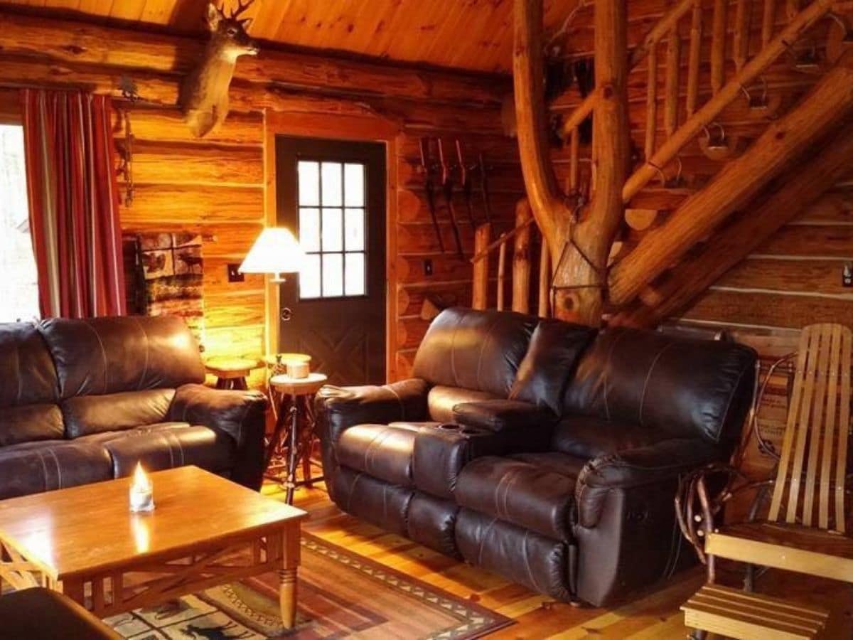 log cabin living room with leather sofa