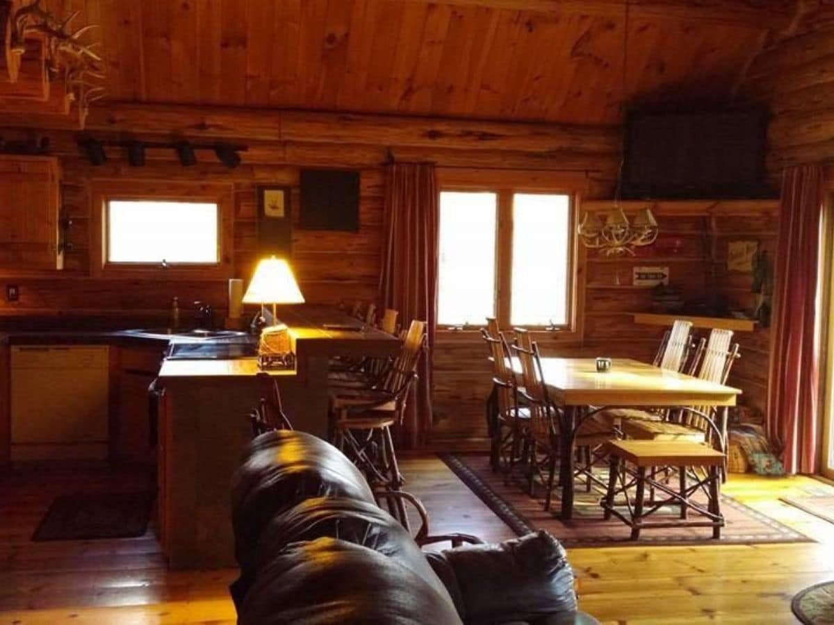 view from door into kitchen and dining room of log cabin