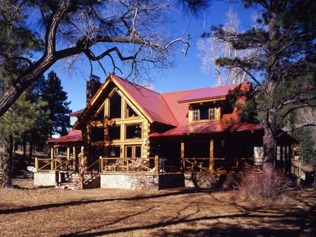 log cabin with red roof