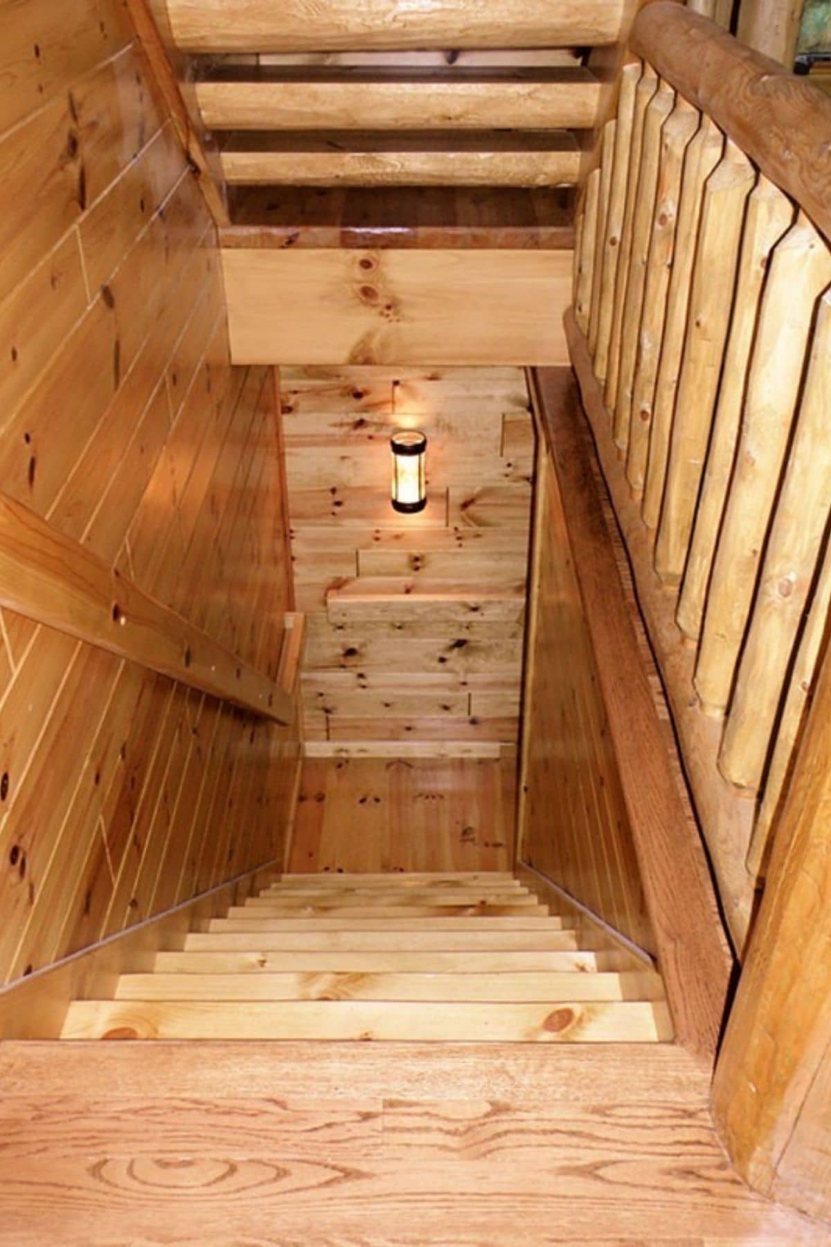 view down staircase in log cabin