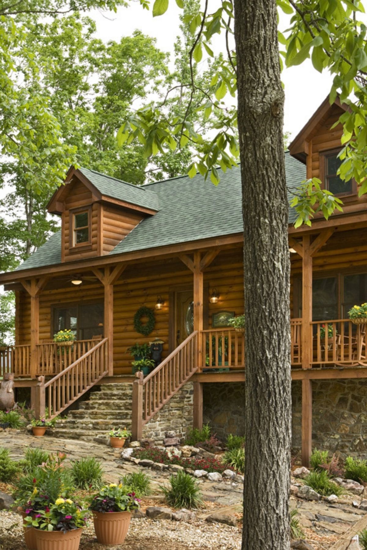 front steps and wood railing to log cabin front door