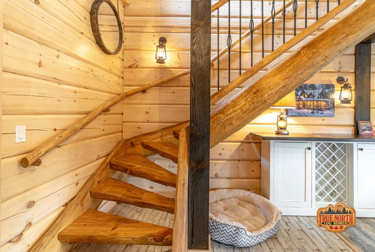 curved wooden stairs leading to second floor of home