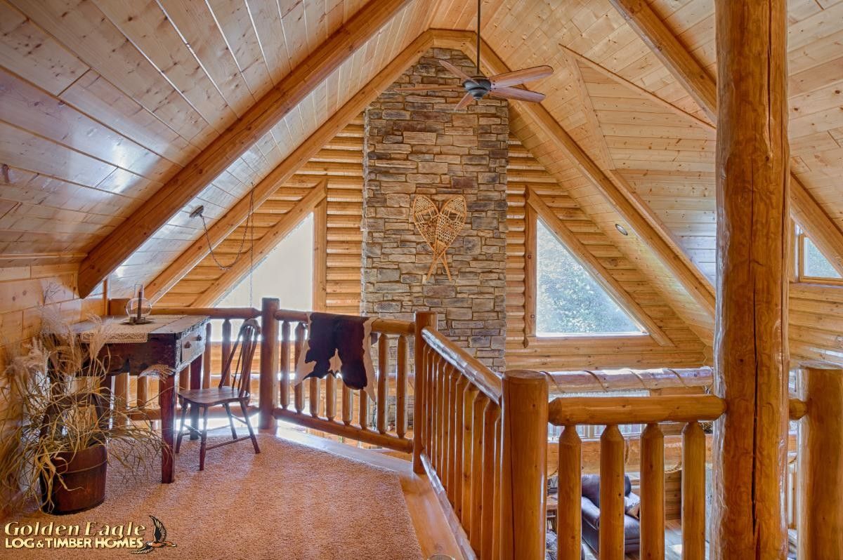 loft in log cabin overlooking great room