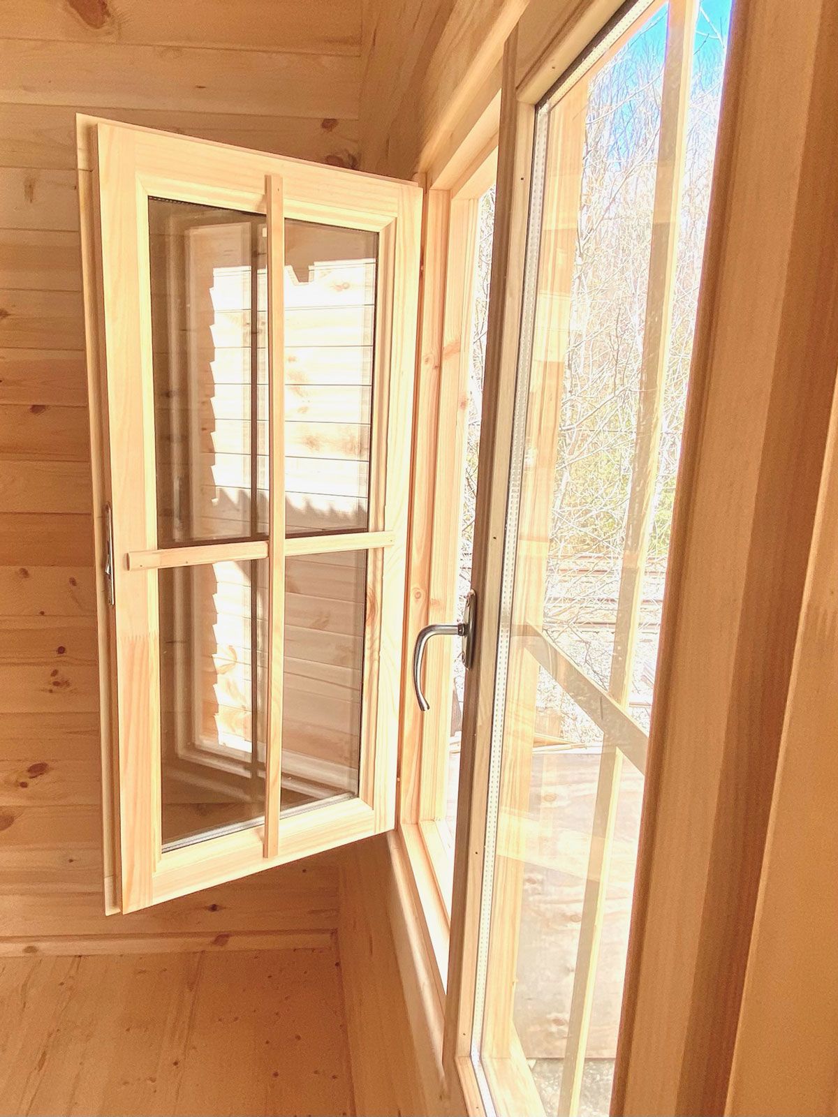 glass panel window in small cabin