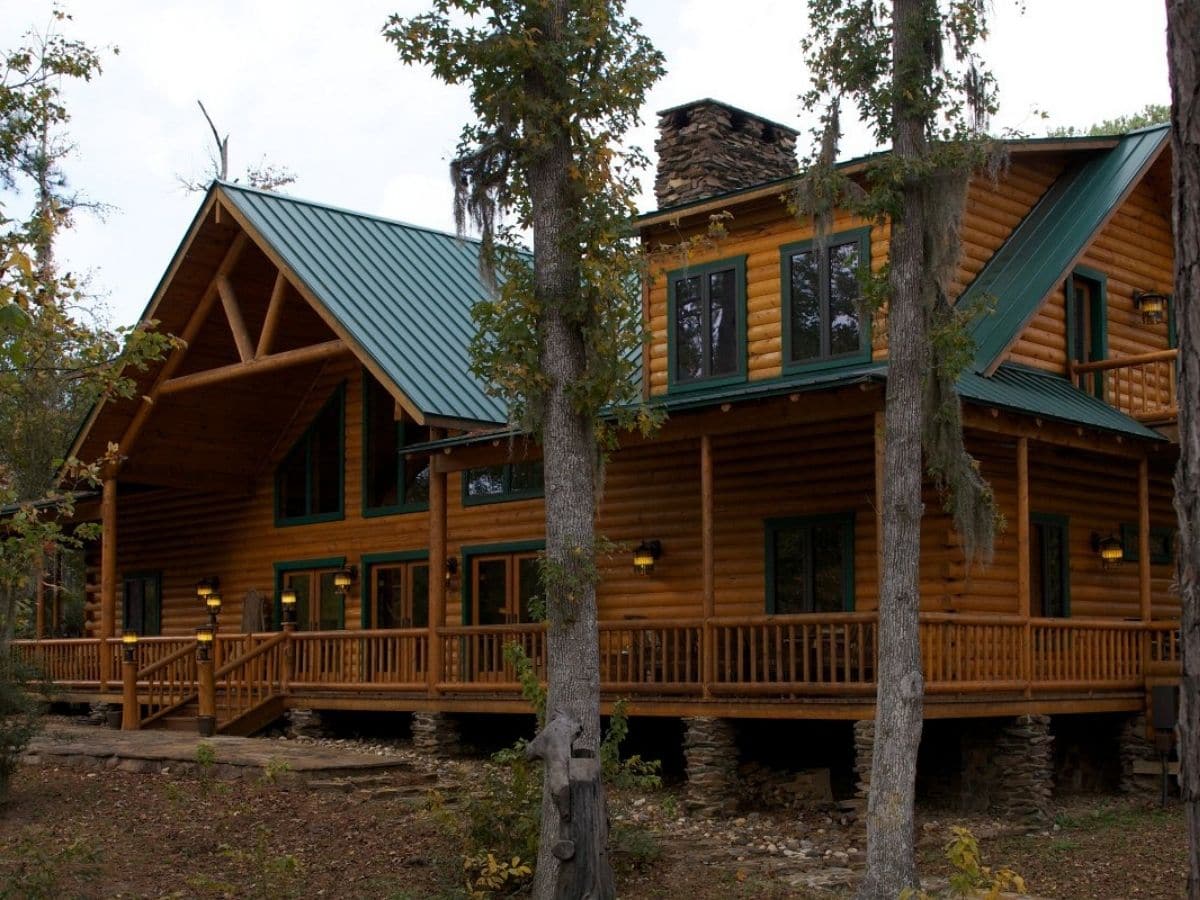 front of cabin with wrap around porches