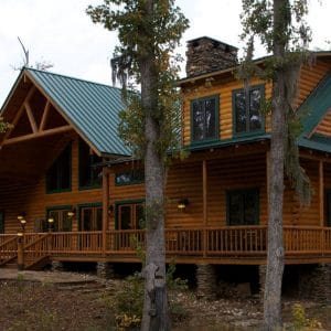 front of cabin with wrap around porches