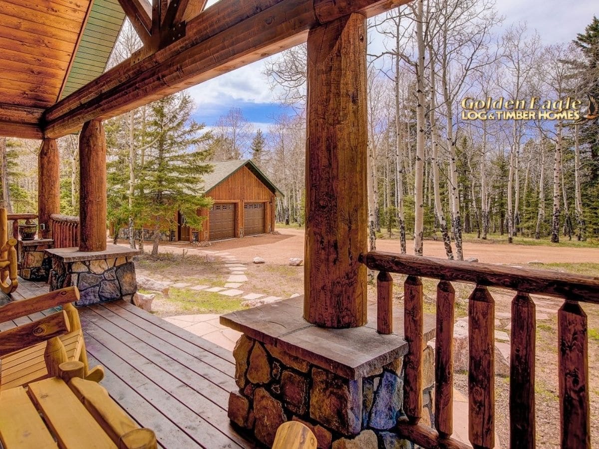 garage in background looking out over front porch of cabin