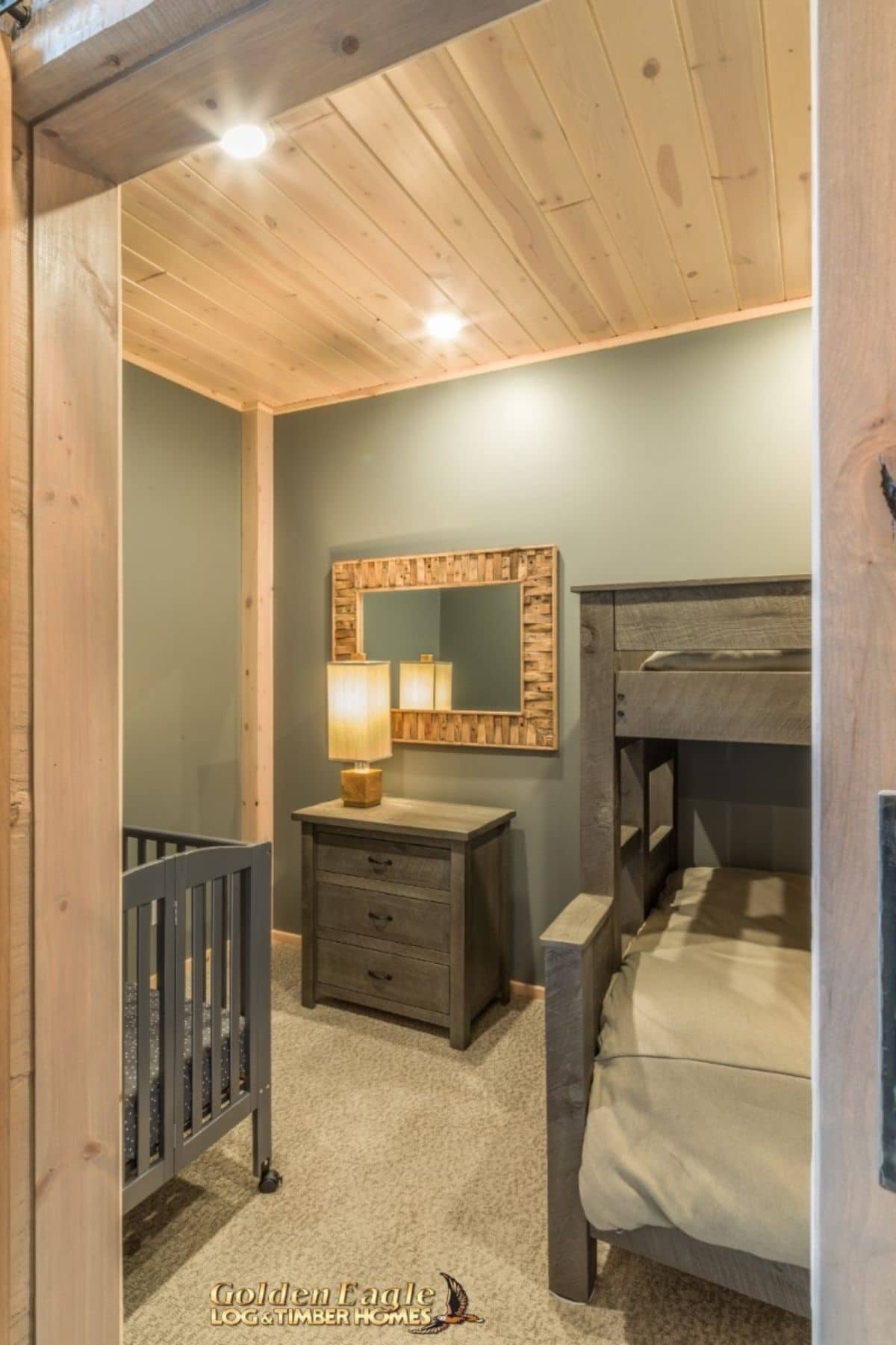 light green walls in bedroom with gray wood trim