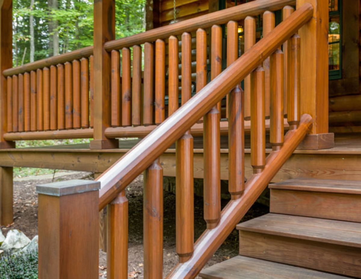 log railing on steps to porch