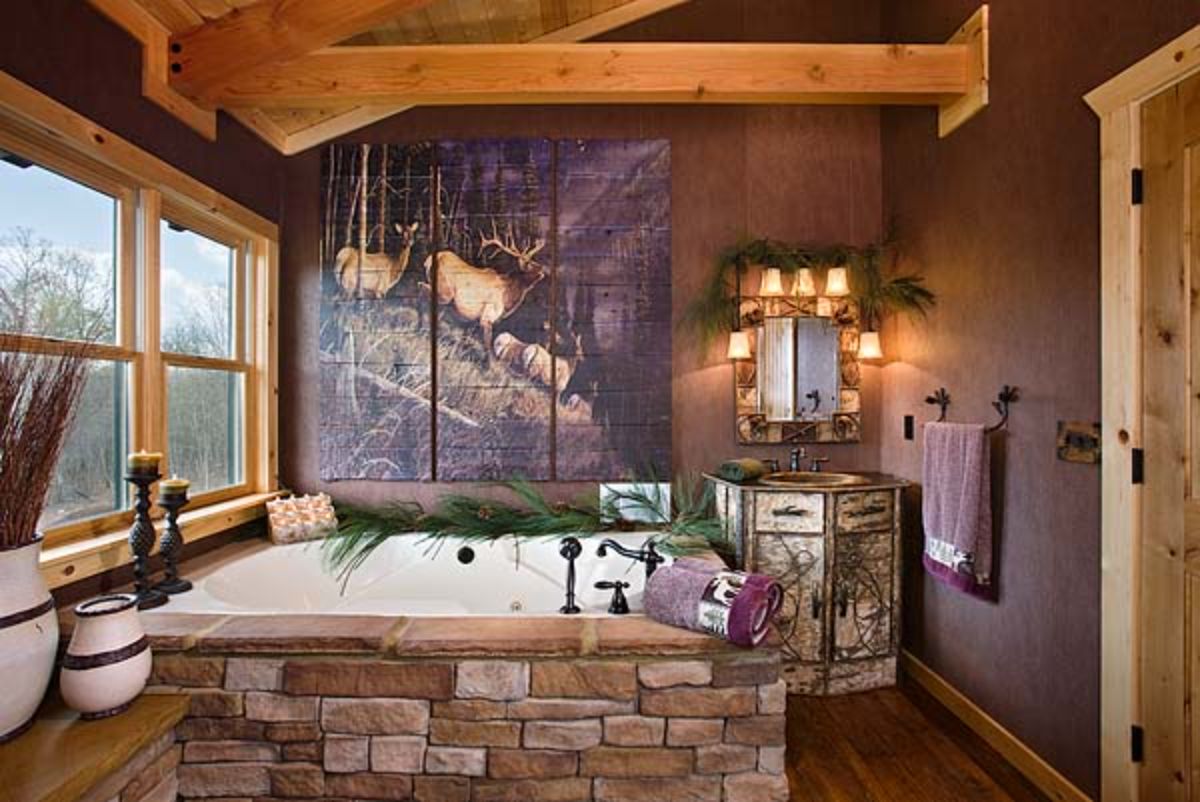 stone surround on soaking bathtub with open window on left of room