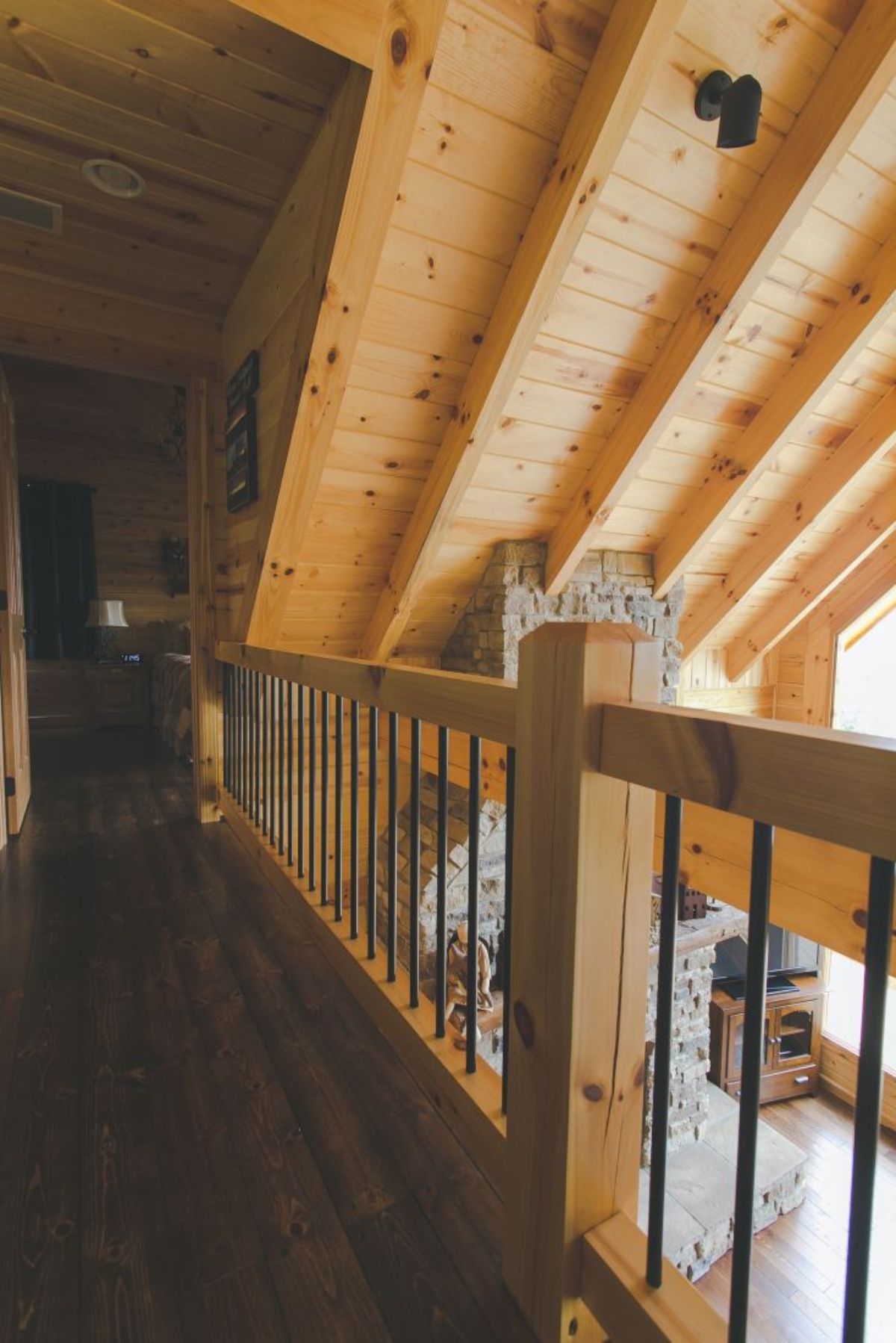 railing overlooking great room from loft