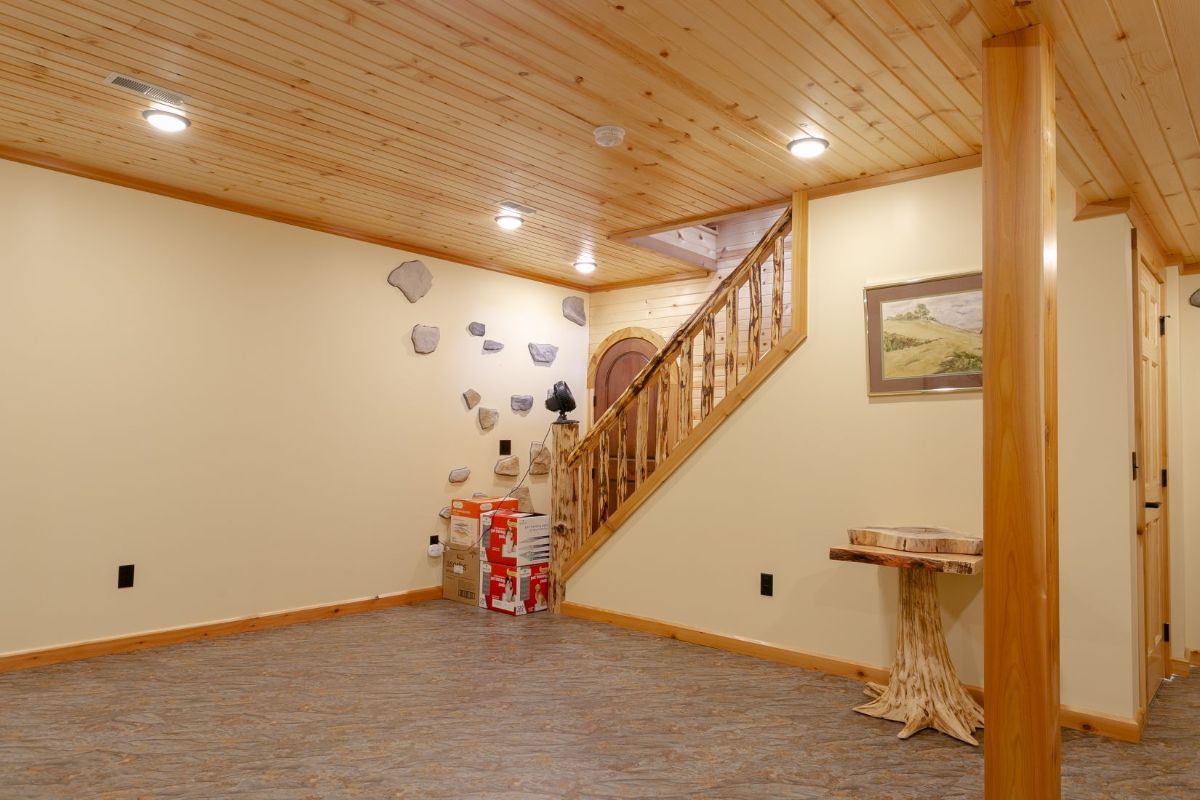 cream walls of basement with stairs on background