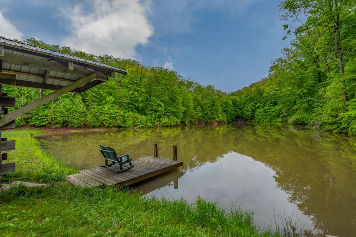 view of lake and wood dock