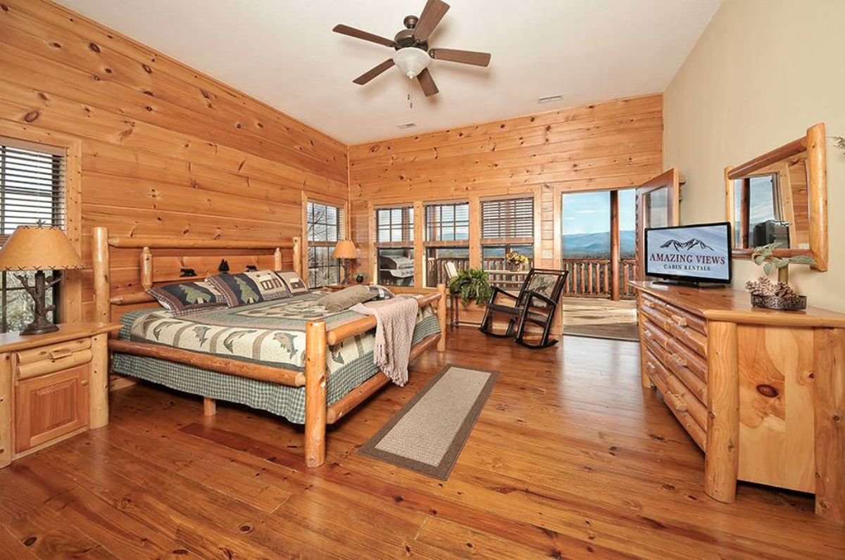 wood frame bed against wall in bedroom with wall of bedroom