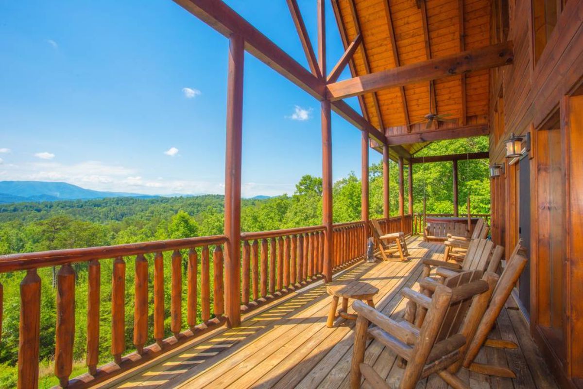 porch with wood chairs and great views on back of hourse