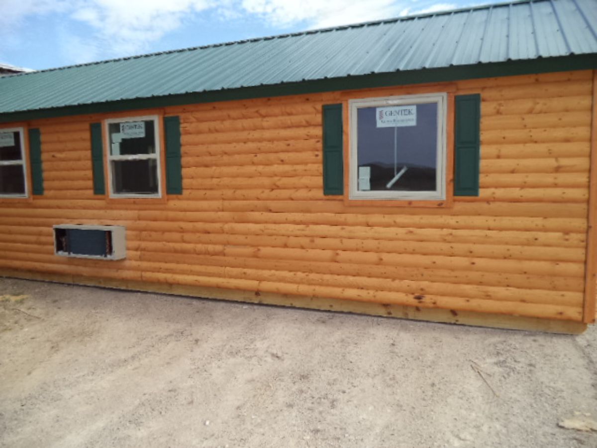 green roof on long log cabin