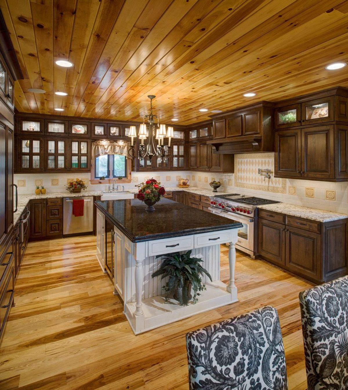 kitchen with dark wood counters white and white backsplash