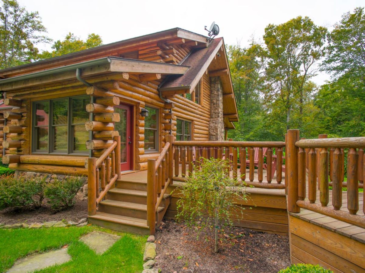 wood deck beside log cabin