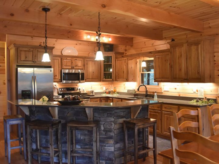 The Chimney Rock Log Cabin Includes a Huge Screened Porch