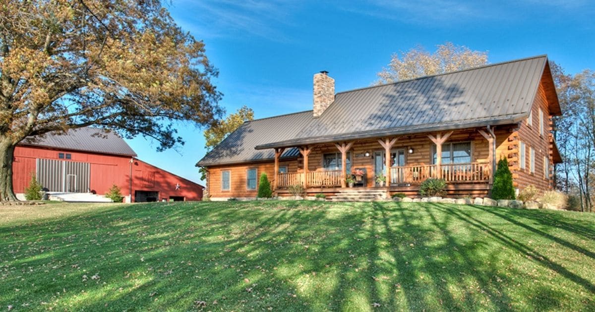 McKay Rustic Log Cabin Has a Barn Style Attached Garage