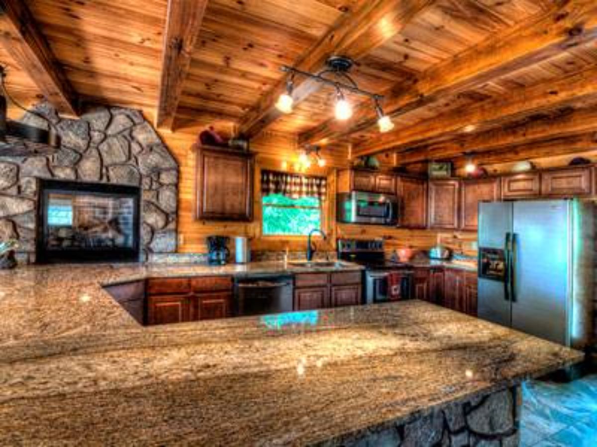 brown granite counter in kitchen with stone in background