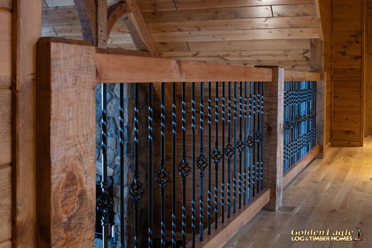 black wrought iron spindles on railing of loft
