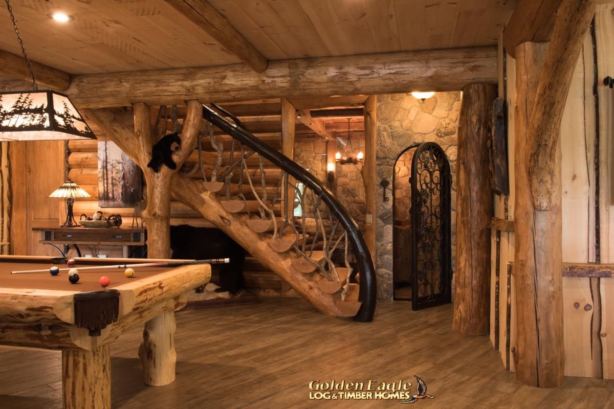 spiraling wood staircase in background of basement