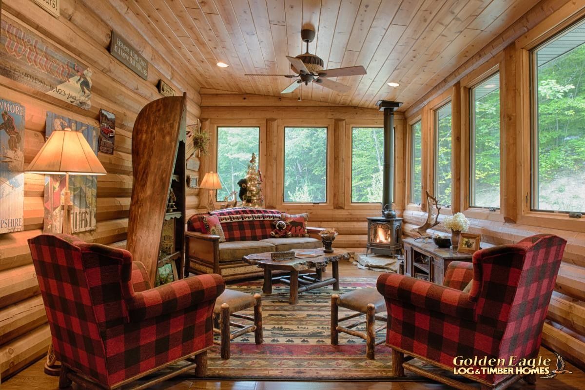 red wingback chairs in sunroom