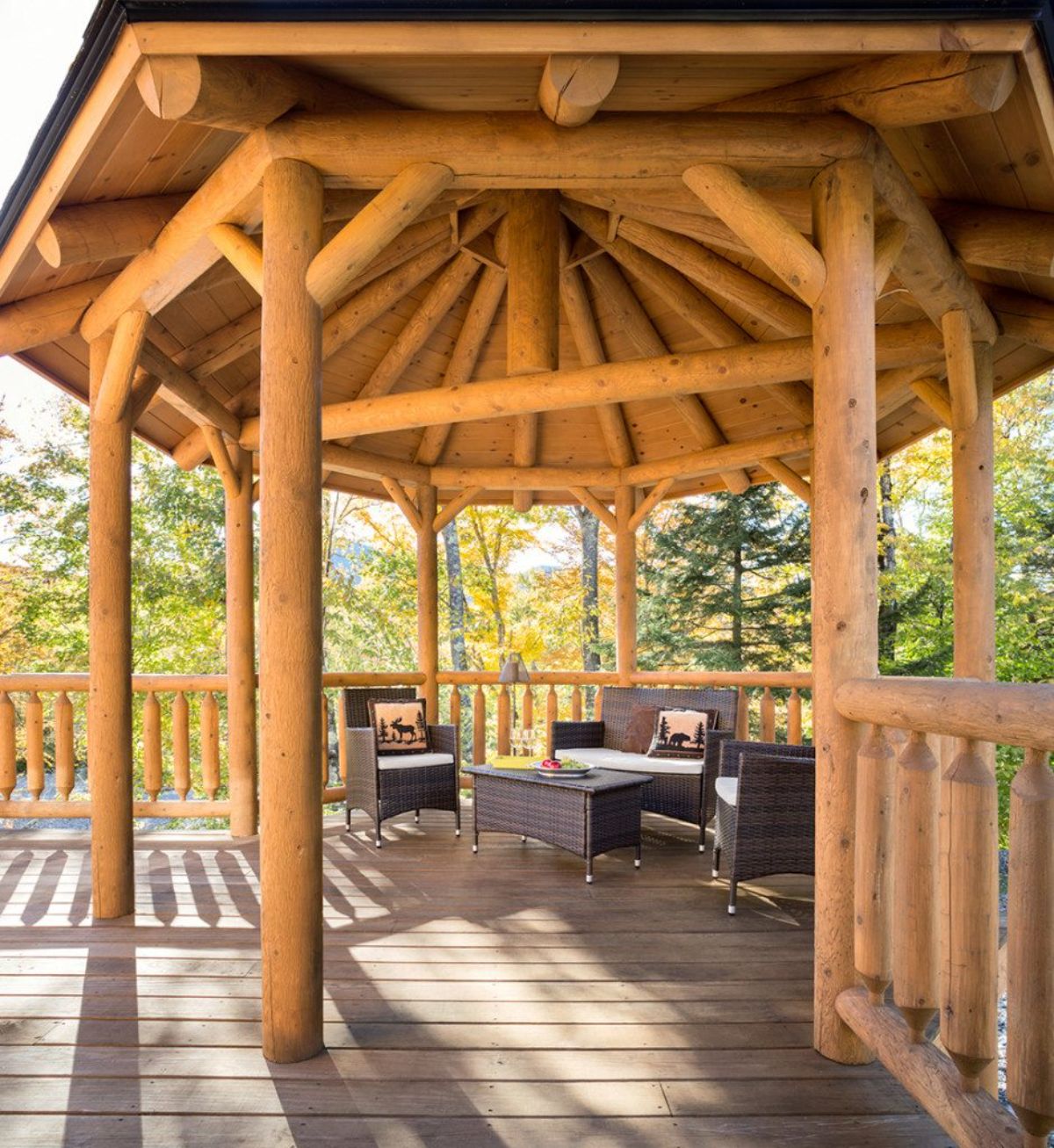 gazebo on porch with chairs against back of space