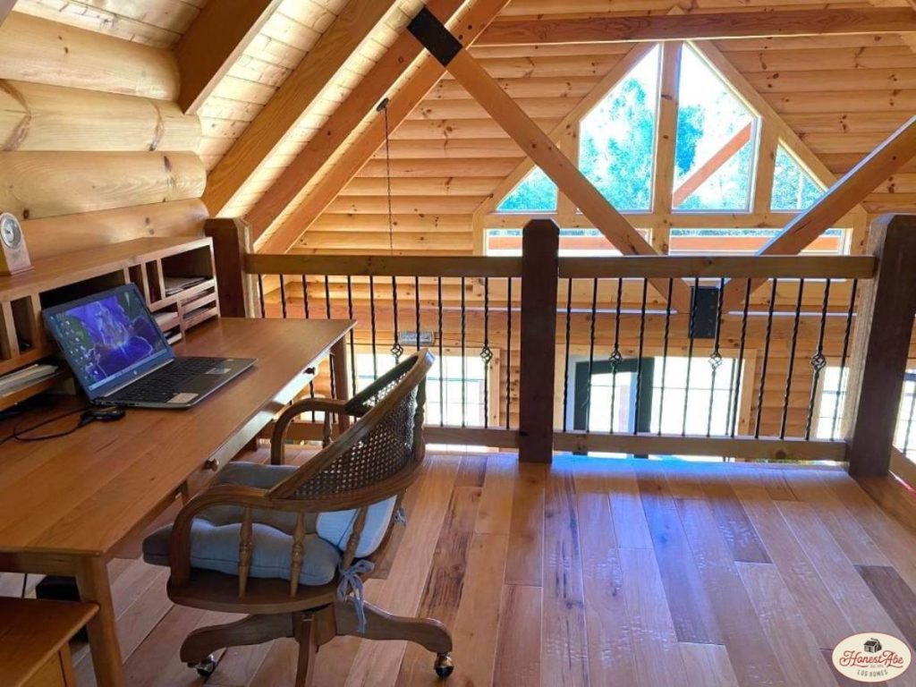 desk in open loft of cabin